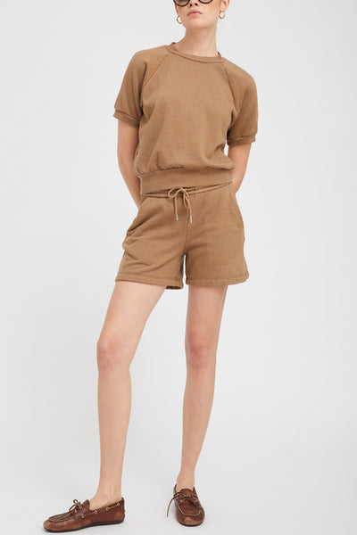 Image of model wearing the SPRWMN sweat shorts front view