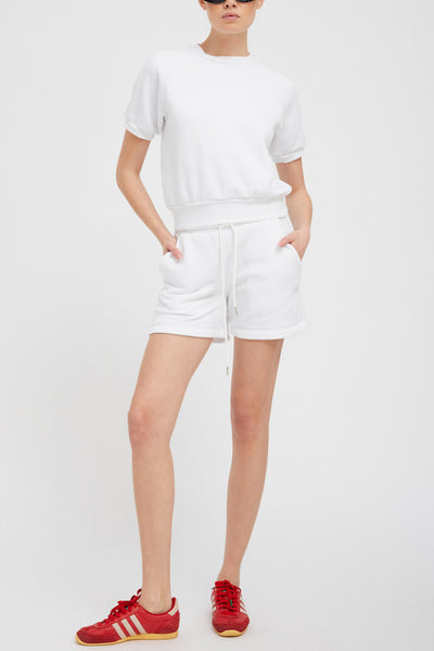 Image of model wearing the SPRWMN sweat shorts front view