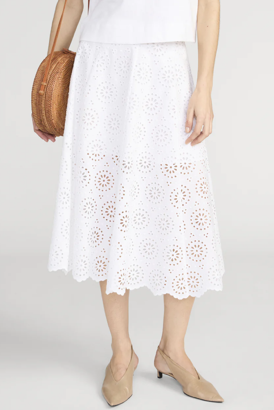 Person wearing a midi length skirt 