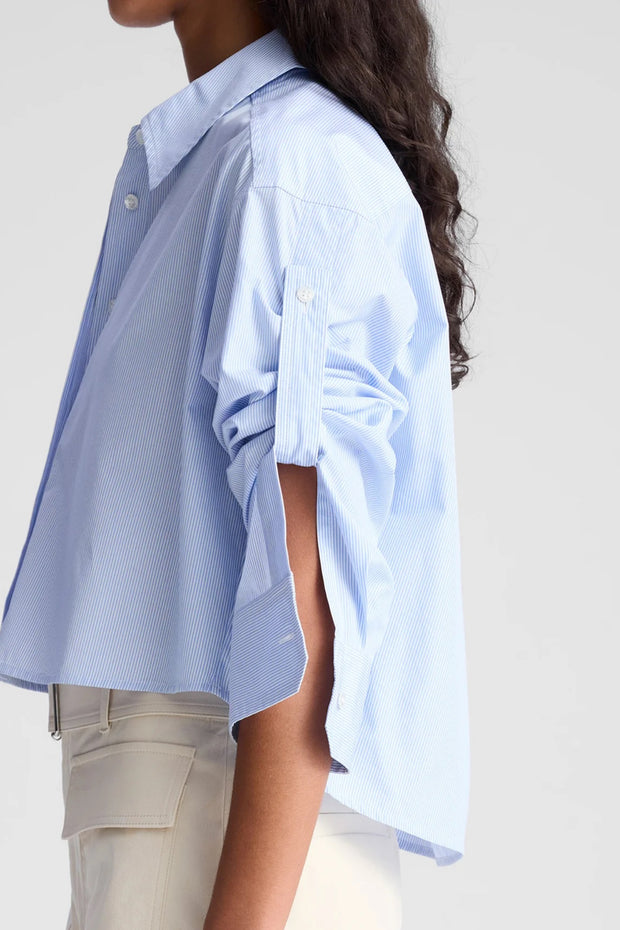 Image of model wearing the A.L.C maude top side view close up
