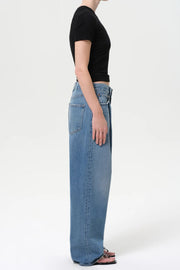 Image of model wearing the Agolde Franka Pleated Baggy Jean side view