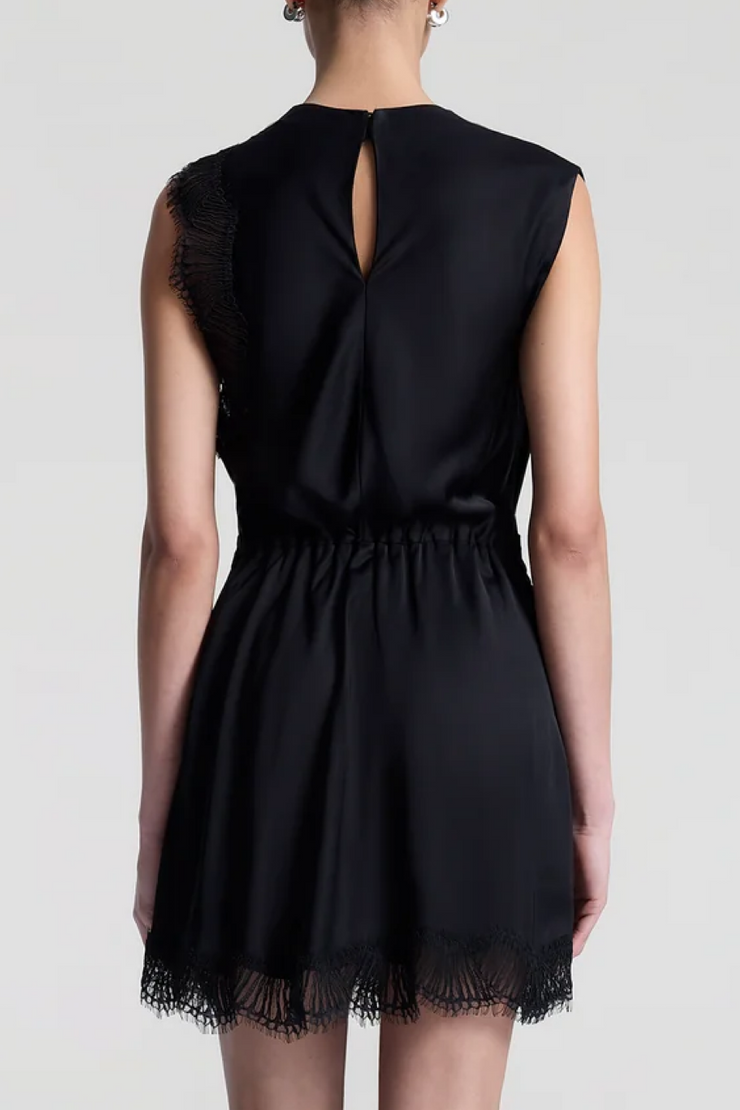 Black dress with lace details on a white background