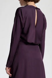 Purple top with open back on a white background