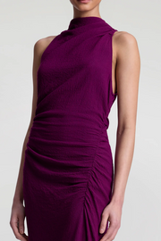 Jewel dress with a high neckline on a white background