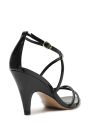 Black high-heeled sandal with thin straps on a white background