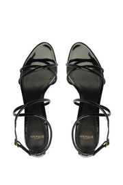 Black high-heeled sandals with strappy design on a white background
