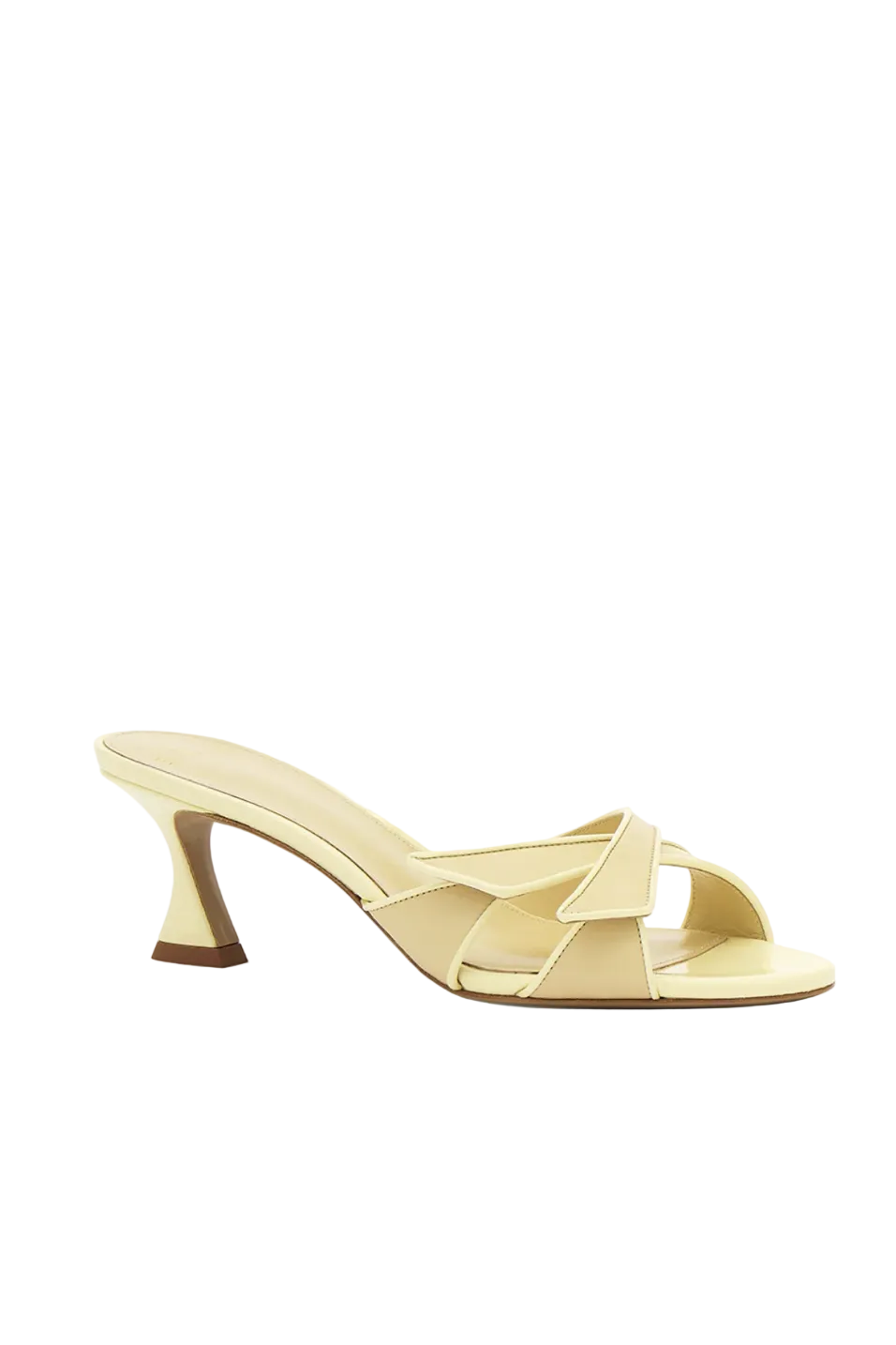 Creamy yellow heeled sandal on a white background