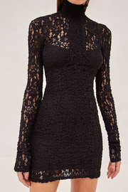 Image of model wearing Alexis Delia dress in noir