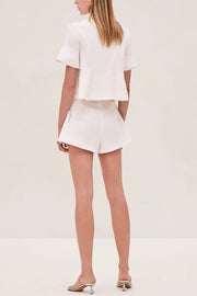 Image of model wearing the Nika Top back view