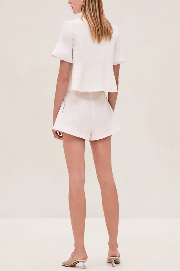 Image of model wearing the Nika Top back view