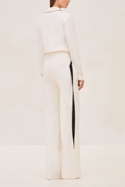Image of model wearing Alexis Roks Pants in ivory