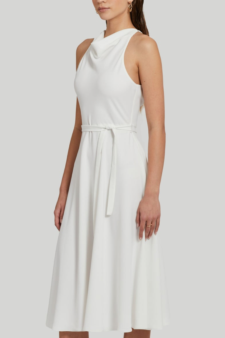 Image of model wearing Amanda Uprichard Elondra dress in ivory