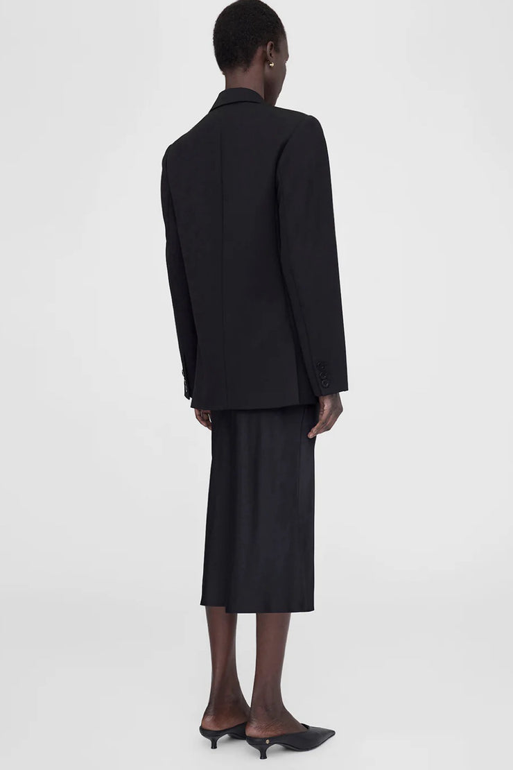 Image of model wearing the Anine Bing Bar Silk Skirt back view