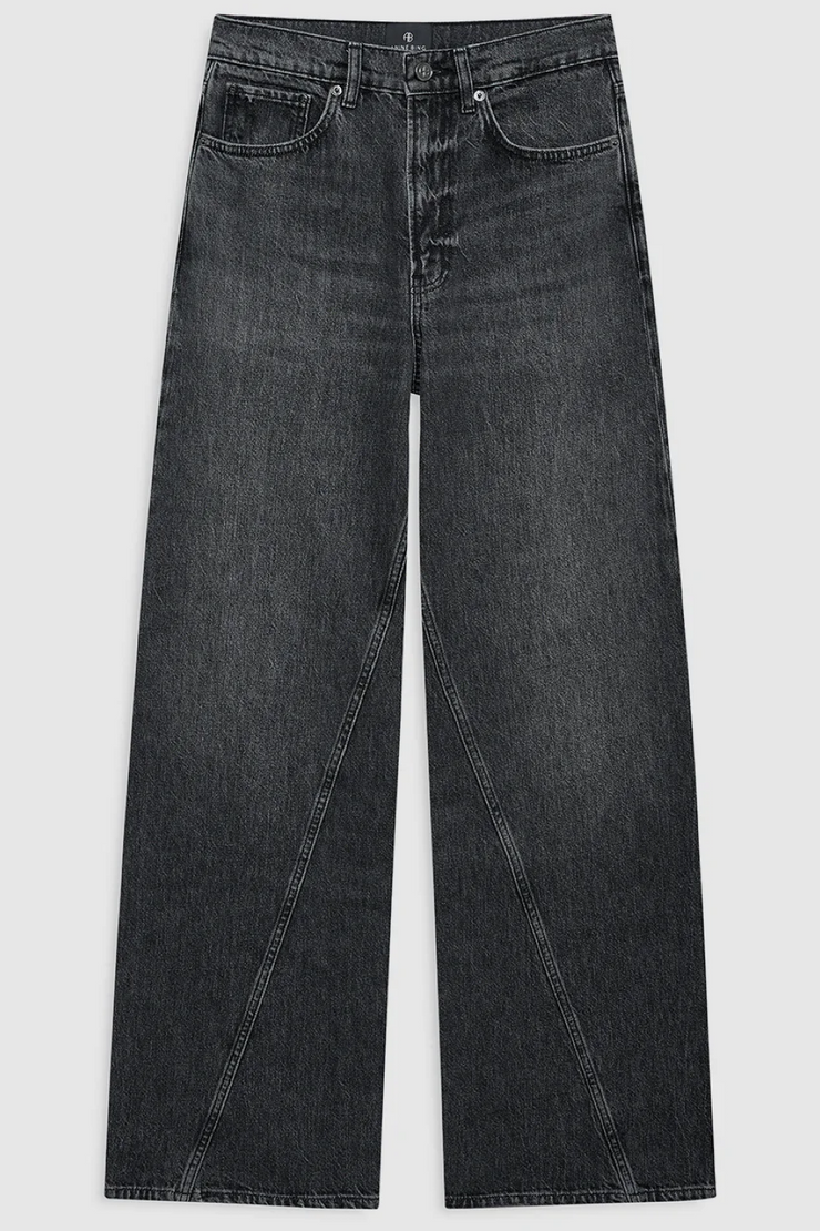 Black jeans on a light gray background