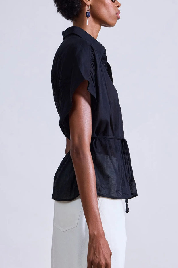 Image of model wearing the Apiece Apart Agni Floaty Top side view