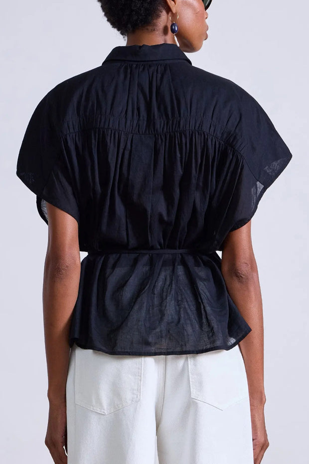 Image of model wearing the Apiece Apart Agni Floaty Top back view