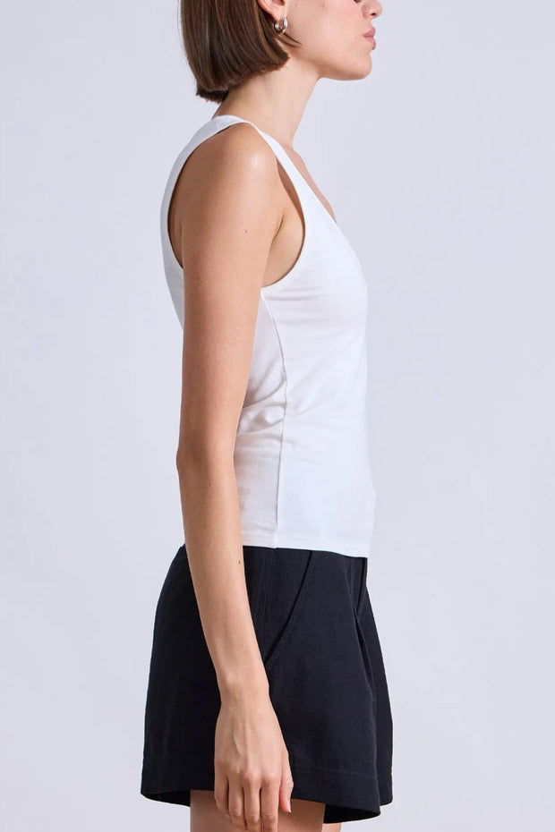 Image of model wearing the Apiece Apart Uri Low Cut Tank side view