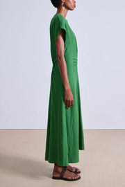 Image of model wearing the Apiece Apart Volta Twist Dress side view