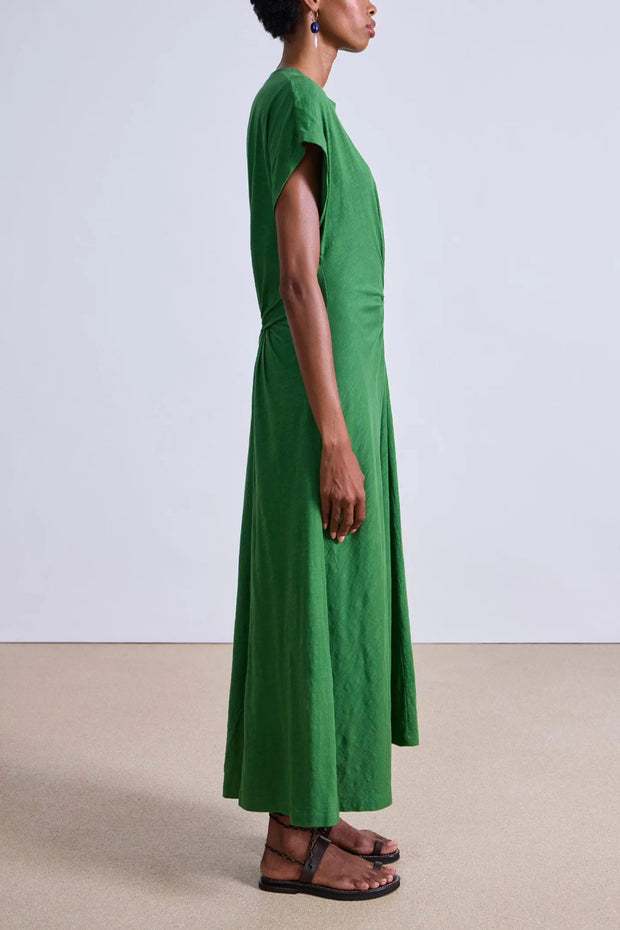 Image of model wearing the Apiece Apart Volta Twist Dress side view
