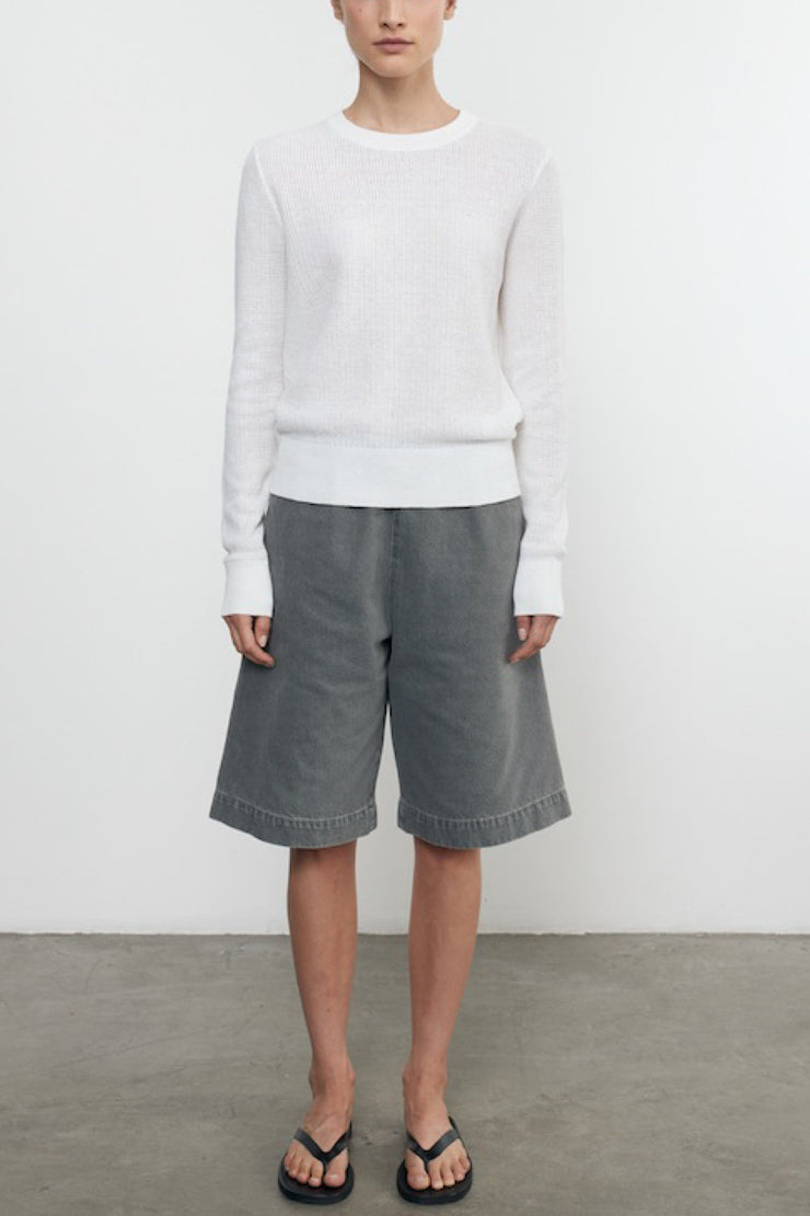 Image of model wearing the Enza Costa Linen Open Knit Crewneck front view