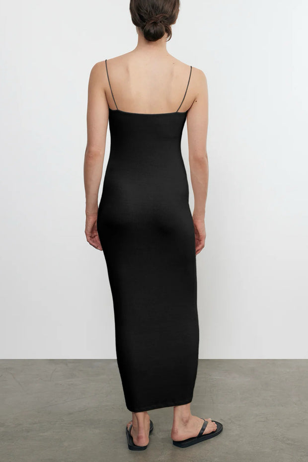 Image of model wearing the Enza Costa Silk Knit Jersey Essential Strappy Dress back view