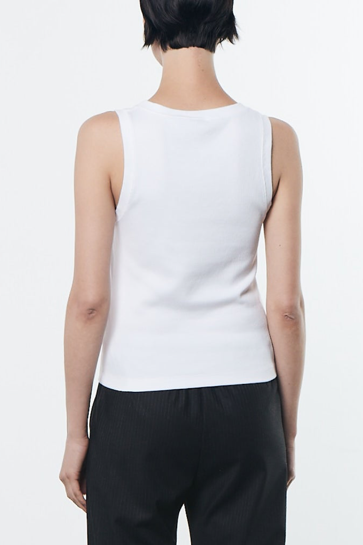Image of model wearing Enza Costa Supima knit u tank in white