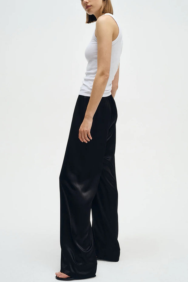 Image of model wearing the Enza Costa Textured Rib Sleeveless U side view