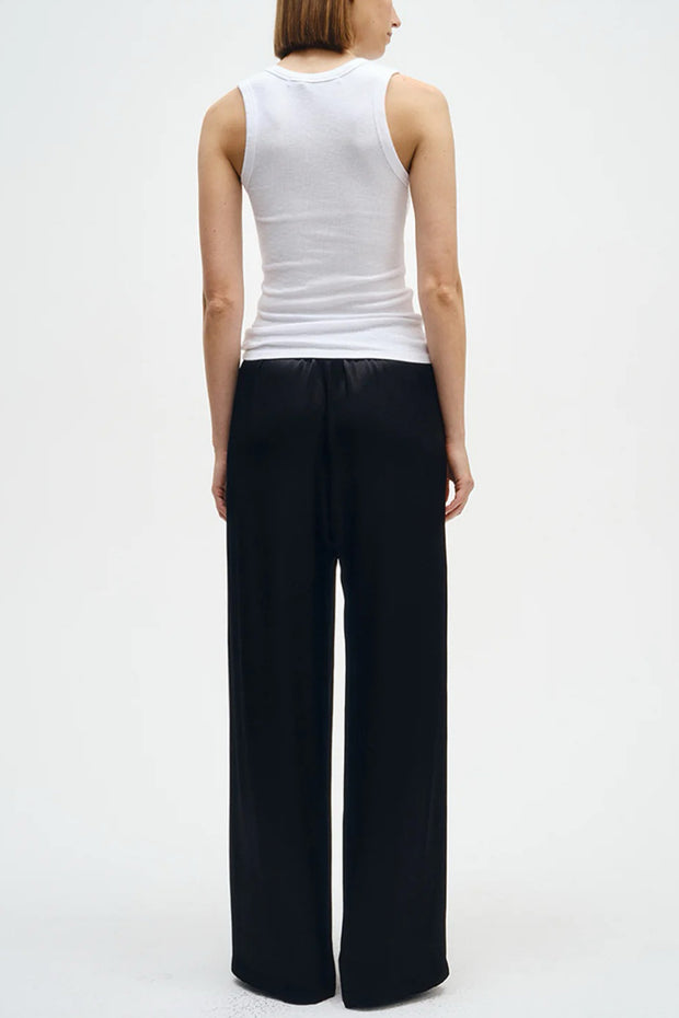Image of model wearing the Enza Costa Textured Rib Sleeveless U back view