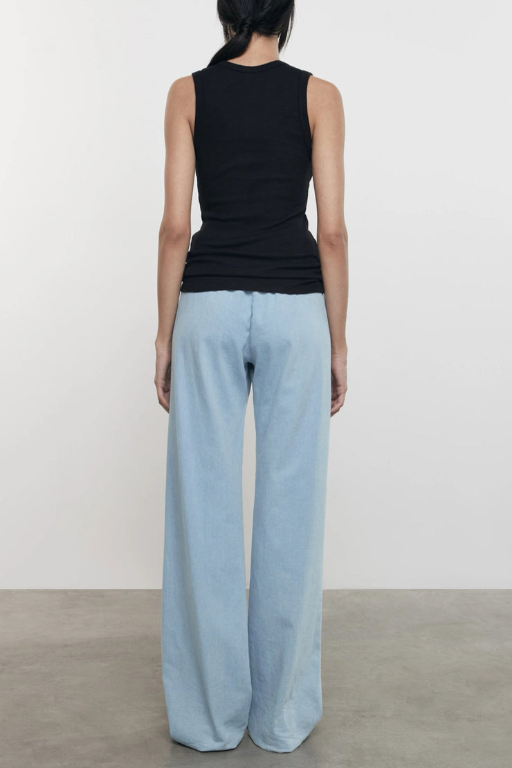 Image of model wearing the Enza Costa Textured Rib Sleeveless U back view