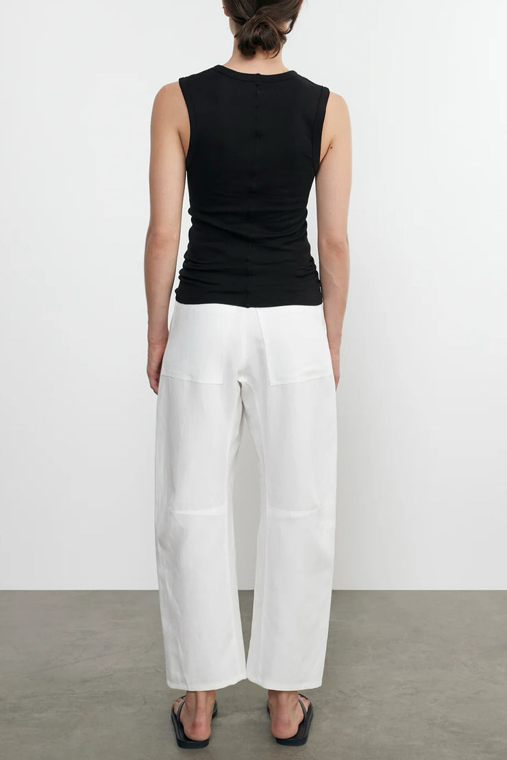 Image of model wearing the Enza Costa Twill Work Pant back view