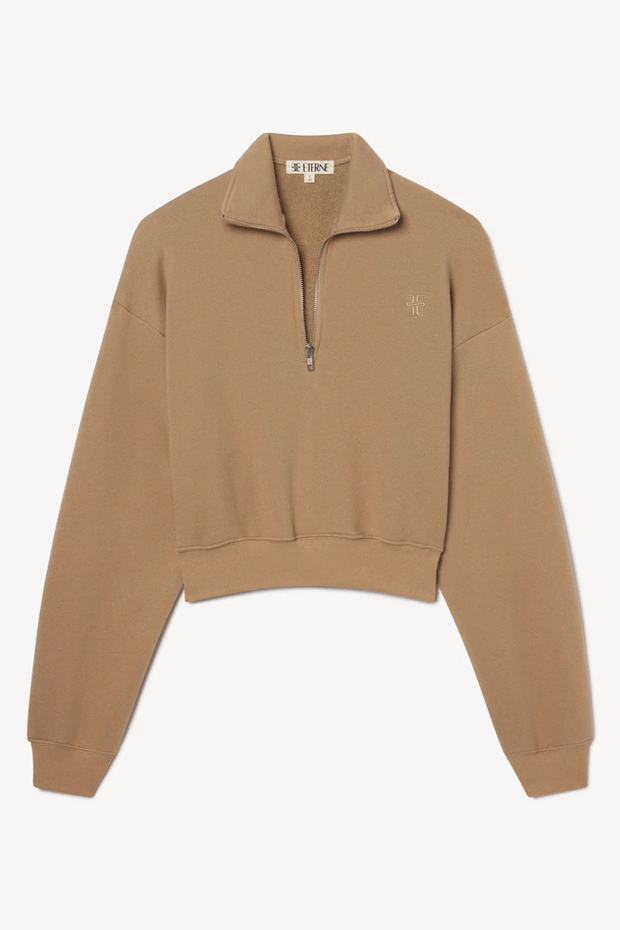 Taupe half-zip sweatshirt on a white background