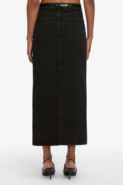 Black denim skirt worn by a person on a white background