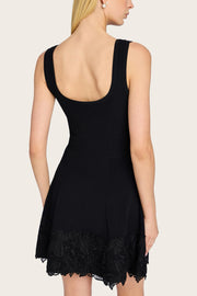 Image of model wearing the Generation Love Orpheus Lace Combo Rib Dress back view