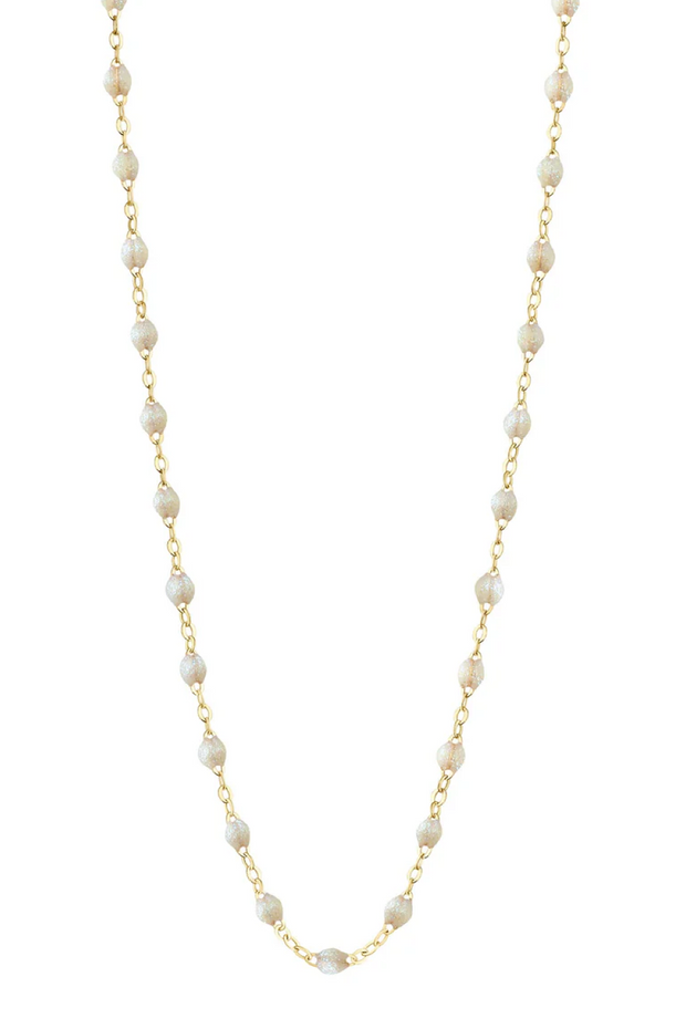 Opal necklace with gold chain on a white background