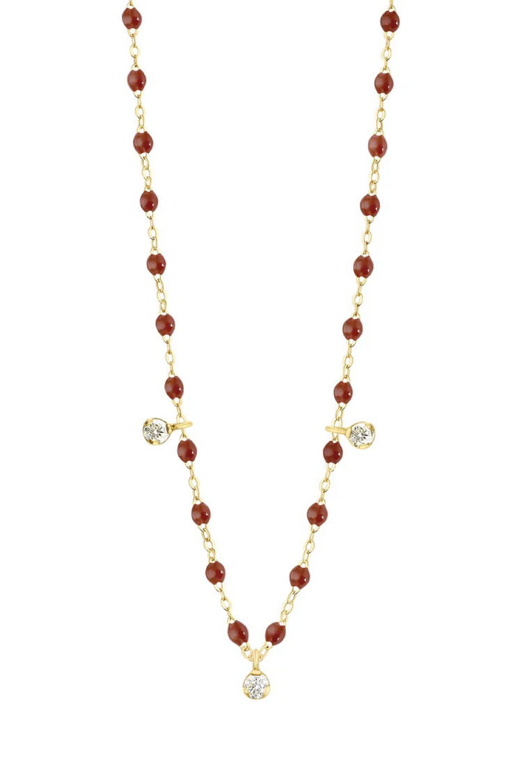 Necklace with moka beads, 3 diamonds and gold chain on a white background