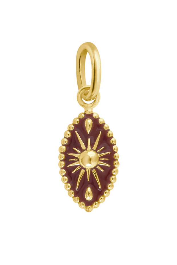 Gold pendant with sun design on a white background
