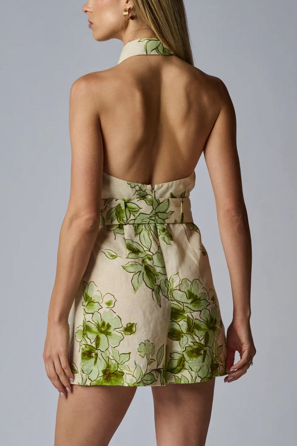 Image of model wearing the Hevron Asha Romper back view
