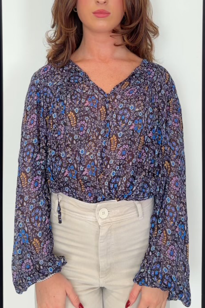 Image of model wearing Isabel Marant Etoile Daytonea top in blue floral
