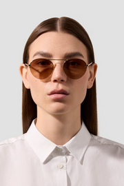 Image of Jennybird the round sunglasses in brown and gold