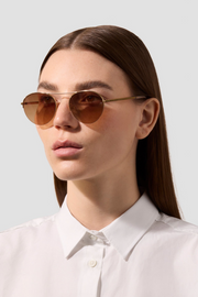 Image of Jennybird the round sunglasses in brown and gold