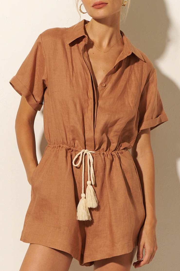 Image of model wearing Kivari Tully playsuit in mocha