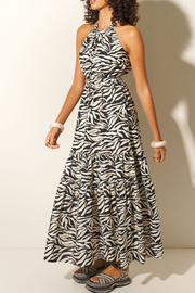 Image of model wearing Kivari Zenya halter maxi dress
