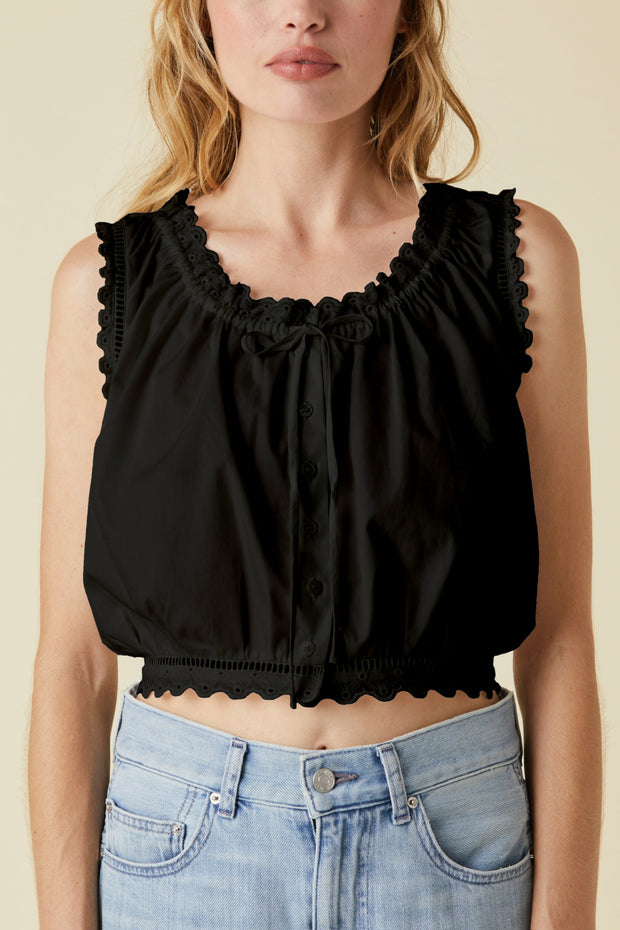 Image of model wearing the Le Jean Eyelet Cami front view close up