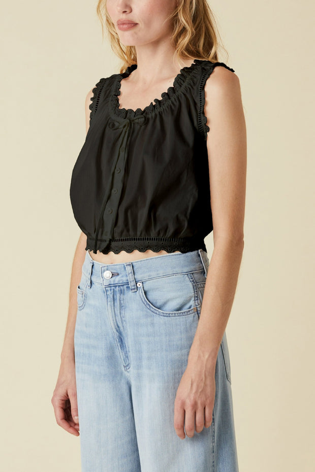 Image of model wearing the Le Jean Eyelet Cami side view