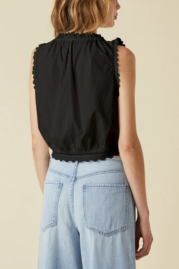 Image of model wearing the Le Jean Eyelet Cami back view