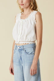 Image of model wearing the Le Jean Eyelet Cami front view 