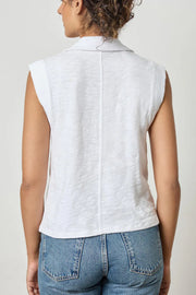 Image of model wearing the lilla p cap sleeve polo back view