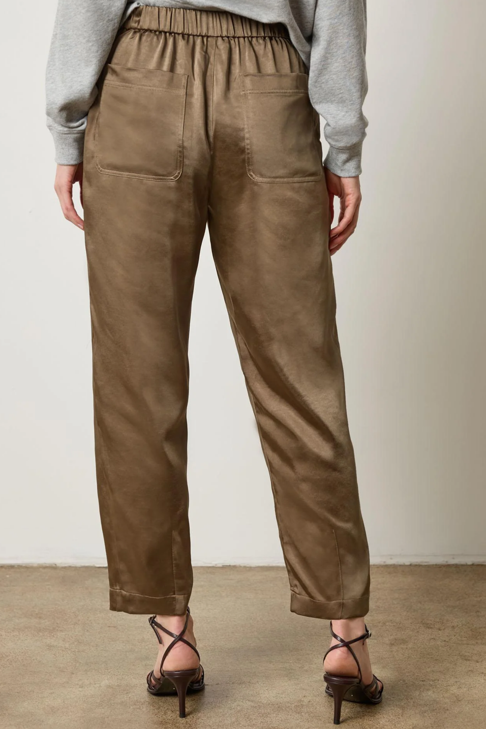 Parsley pants worn by a person on a plain background