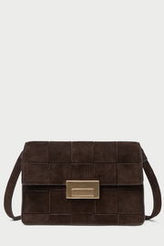 Brown textured handbag with a gold clasp on a light gray background