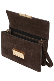 Brown leather clutch bag with gold accents on a white background